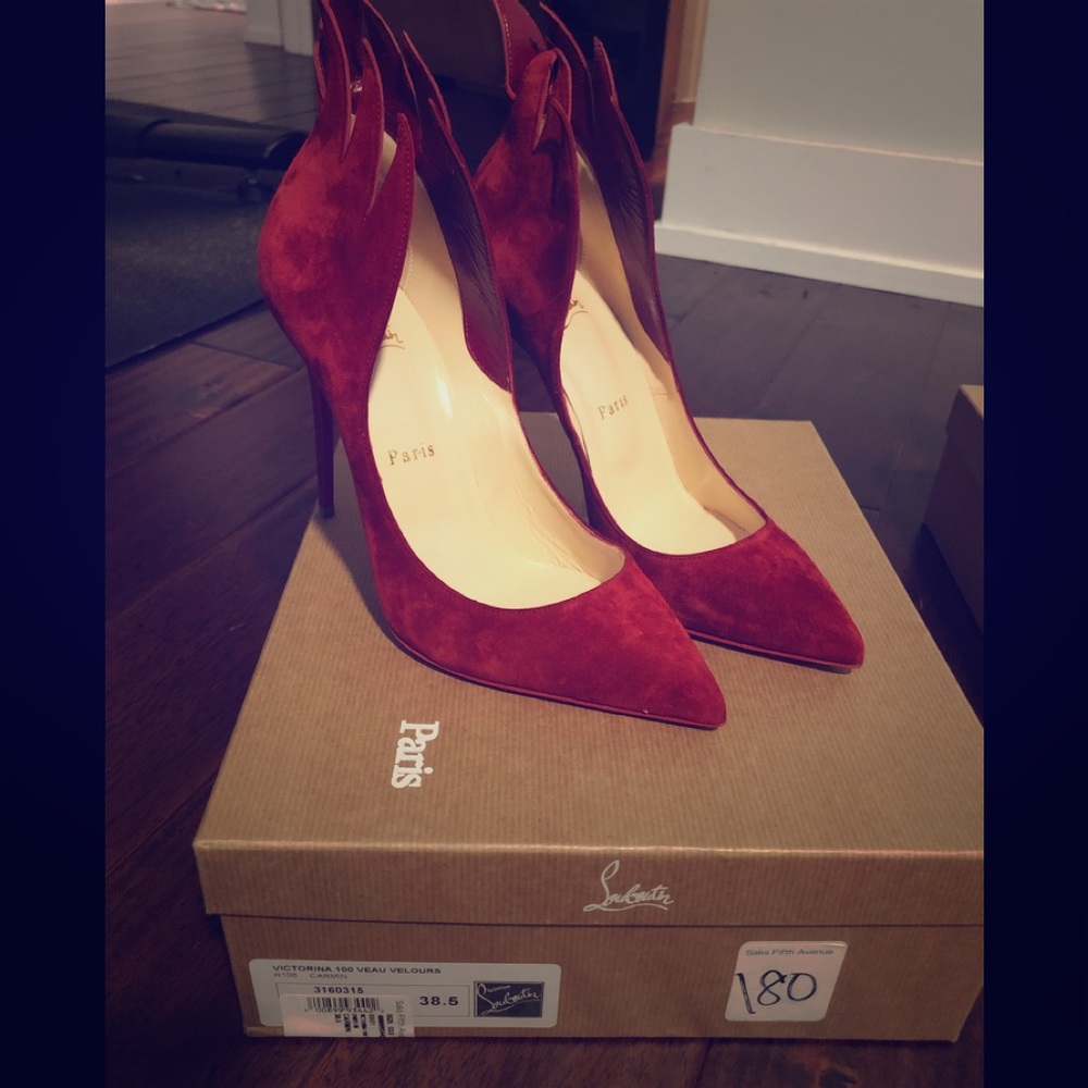 Red Louboutin Pumps
